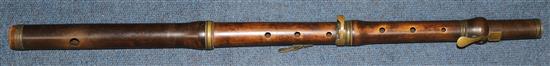 An early 19th century brass mounted concert flute, 23.75in.